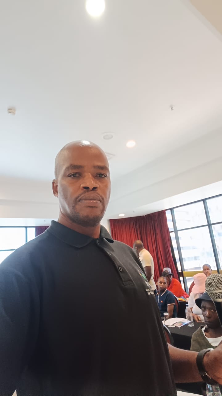 Workshop facilitator in black polo shirt
